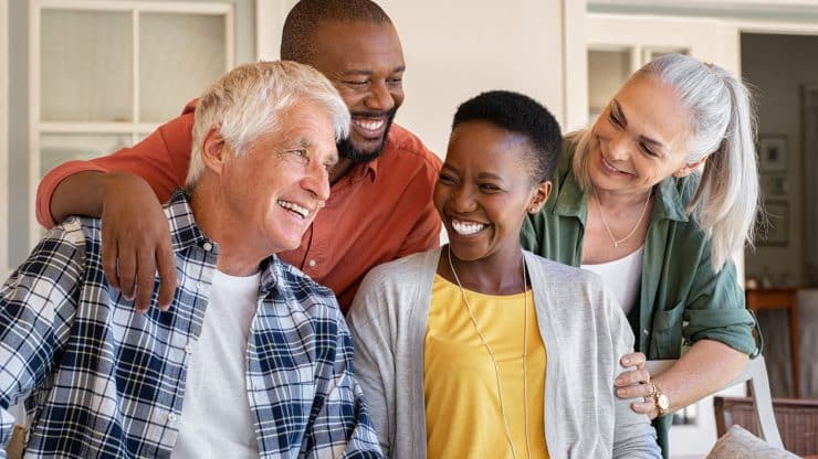 Laughing senior friends with happy women