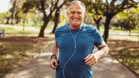 Senior man going for a run and living a healthy lifestyle for longevity