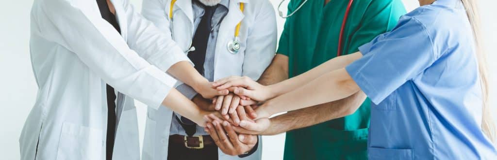 Teamwork doctor on white background